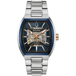 Bulova 98A319 Maquina watch with 40mm rose gold- and silver-tone stainless steel case, blue patterned dial with skeletonized movement, and silver-tone stainless steel bracelet—front view.