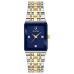 Bulova Quadra 98P177 women's watch featuring a 20.5mm two-tone stainless steel case, blue dial with diamond accents, and a two-tone stainless steel bracelet—front view.