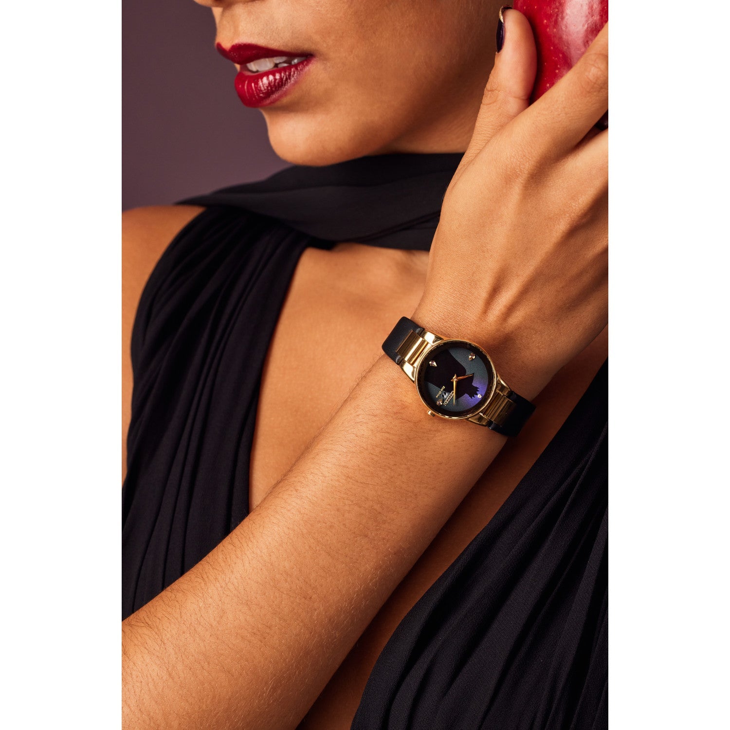 Model wearing the Citizen Eco-Drive Disney Evil Queen Shadow Watch GA1082-46W, demonstrating its elegant presence on the wrist.