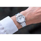 Model wearing the Citizen EM0870-58A, demonstrating its elegant and sophisticated wrist presence.