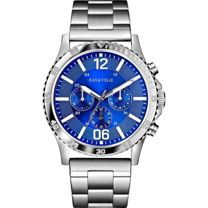Caravelle by Bulova 43A145 watch featuring a 44mm stainless steel case, blue dial with chronograph sub-dials, and a stainless steel bracelet—front view.