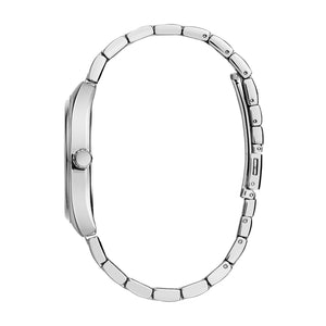 Profile view of the Caravelle 43C120, highlighting its saddle-shaped case design and mineral crystal.