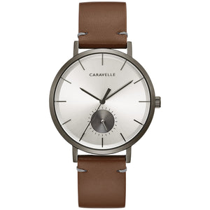 aravelle by Bulova 44A120 men's watch featuring a silver-colored dial with index markings and a 24-hour sub-dial at six o'clock, encased in a 39.5mm grey steel case, paired with a brown leather strap.​