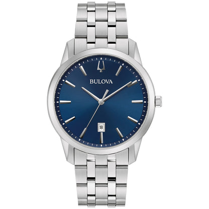 Bulova Sutton 96B338 men's watch featuring a blue dial with silver-toned hands and markers, date display at six o'clock, and a stainless steel bracelet—front view.