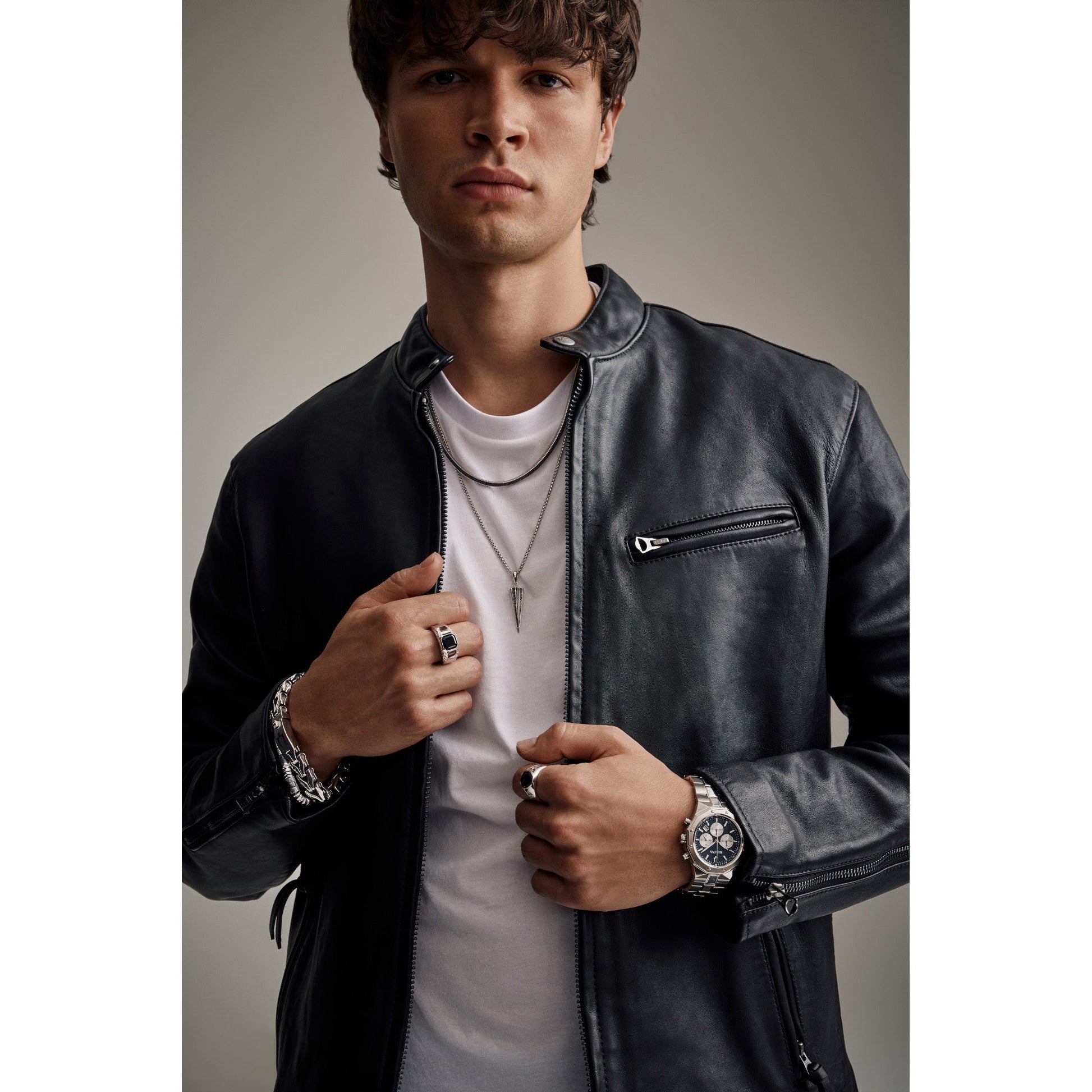 Hand wearing Bulova BVR1032-WSOX, showcasing the ring’s size, onyx centerpiece, and refined metal shine.