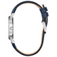 Profile view of the Bulova 96M146, highlighting its slim-profile stainless steel case and smooth grain dark blue leather strap.