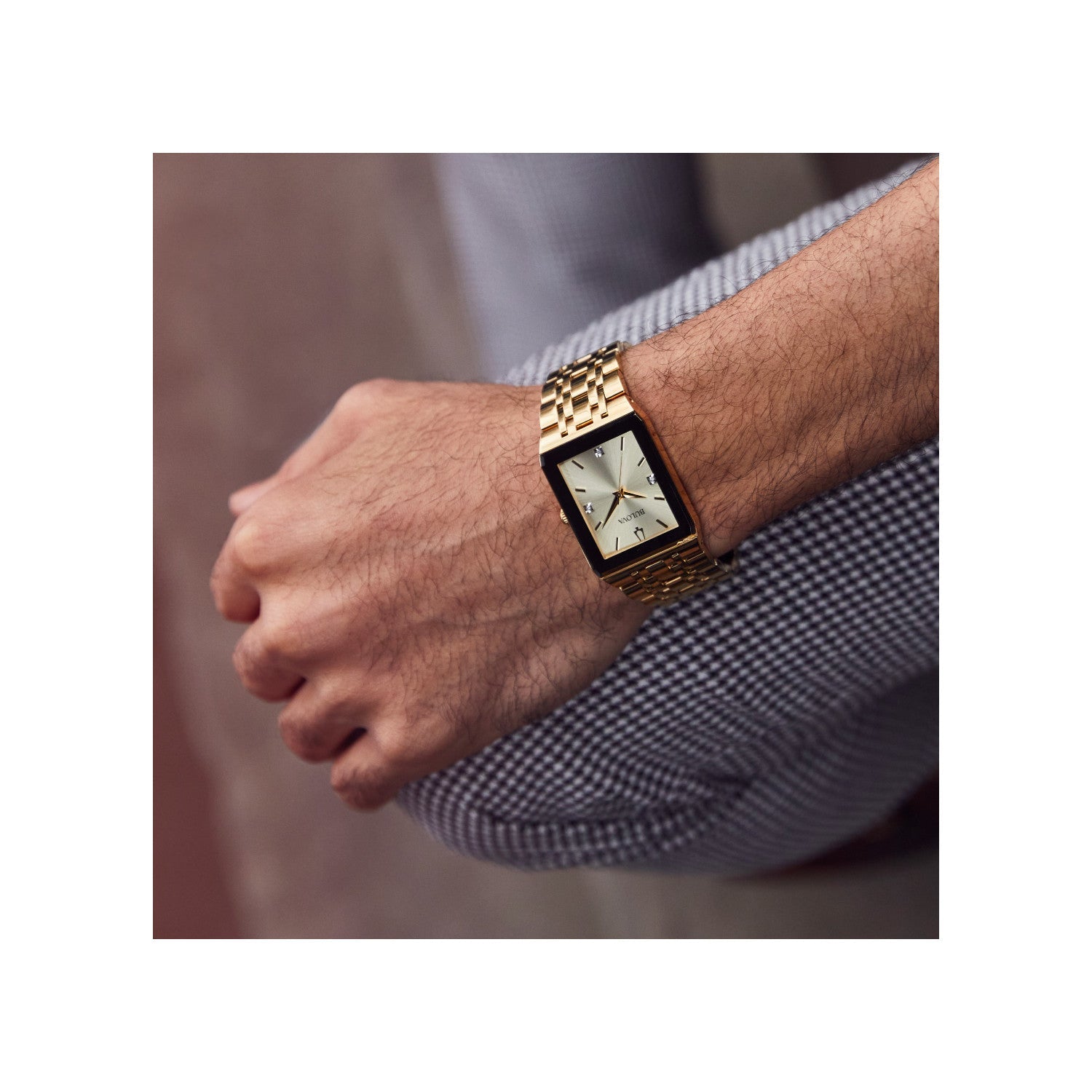 Model wearing the Bulova Quadra 97D120, demonstrating its sleek and modern presence on the wrist.