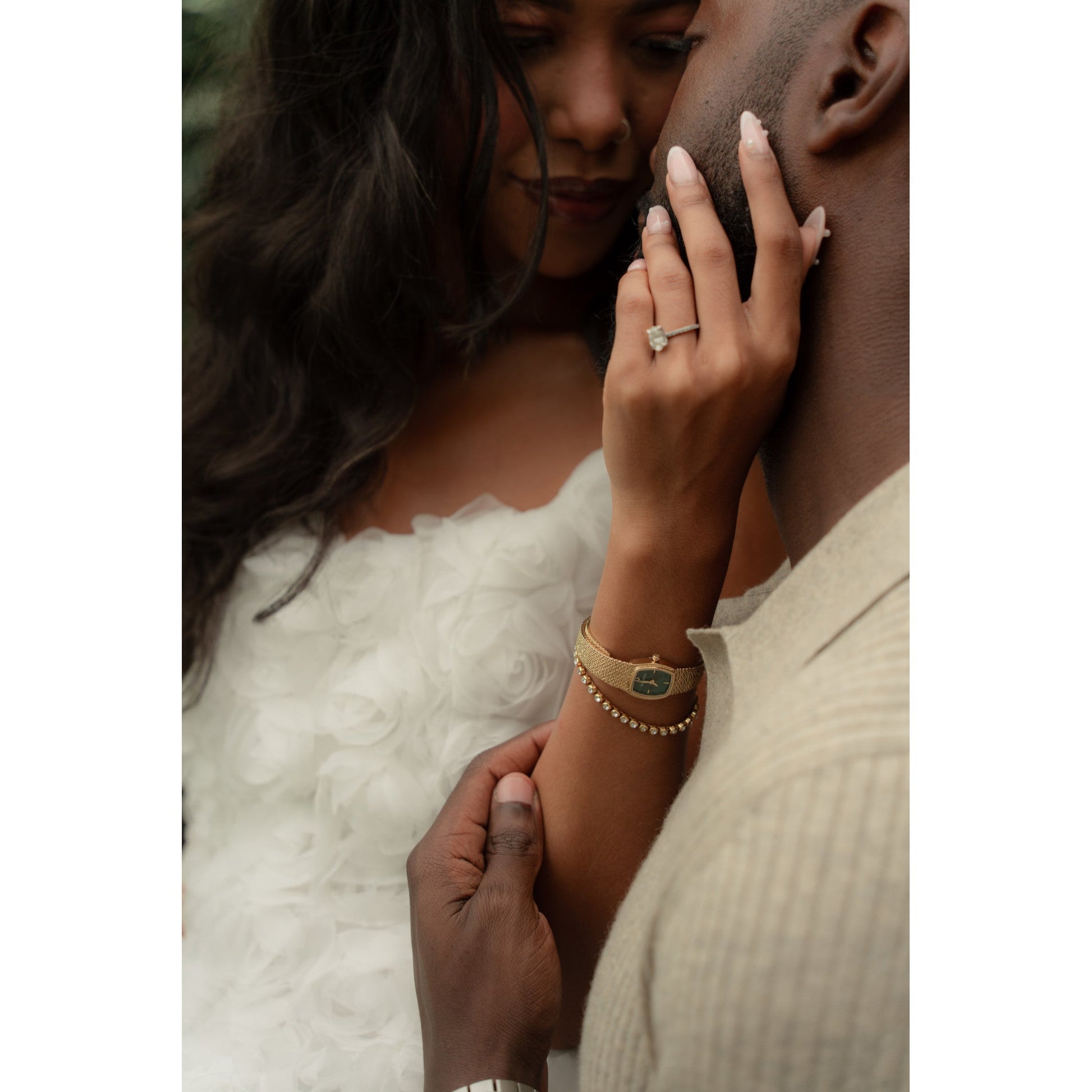 Model wearing the Bulova 97L184 on wrist, showcasing the green malachite dial and mesh bracelet in a refined lifestyle setting.