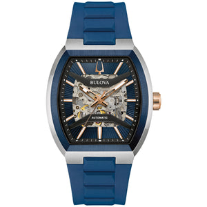Bulova 98A318 Maquina men's watch with rose gold-tone tonneau case, skeleton dial showcasing automatic movement, and blue patterned background—front view.