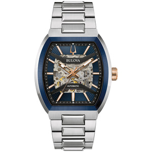 Bulova 98A319 Maquina watch with 40mm rose gold- and silver-tone stainless steel case, blue patterned dial with skeletonized movement, and silver-tone stainless steel bracelet—front view.
