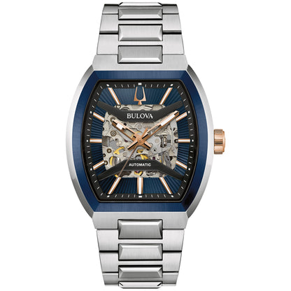 Bulova 98A319 Maquina watch with 40mm rose gold- and silver-tone stainless steel case, blue patterned dial with skeletonized movement, and silver-tone stainless steel bracelet—front view.