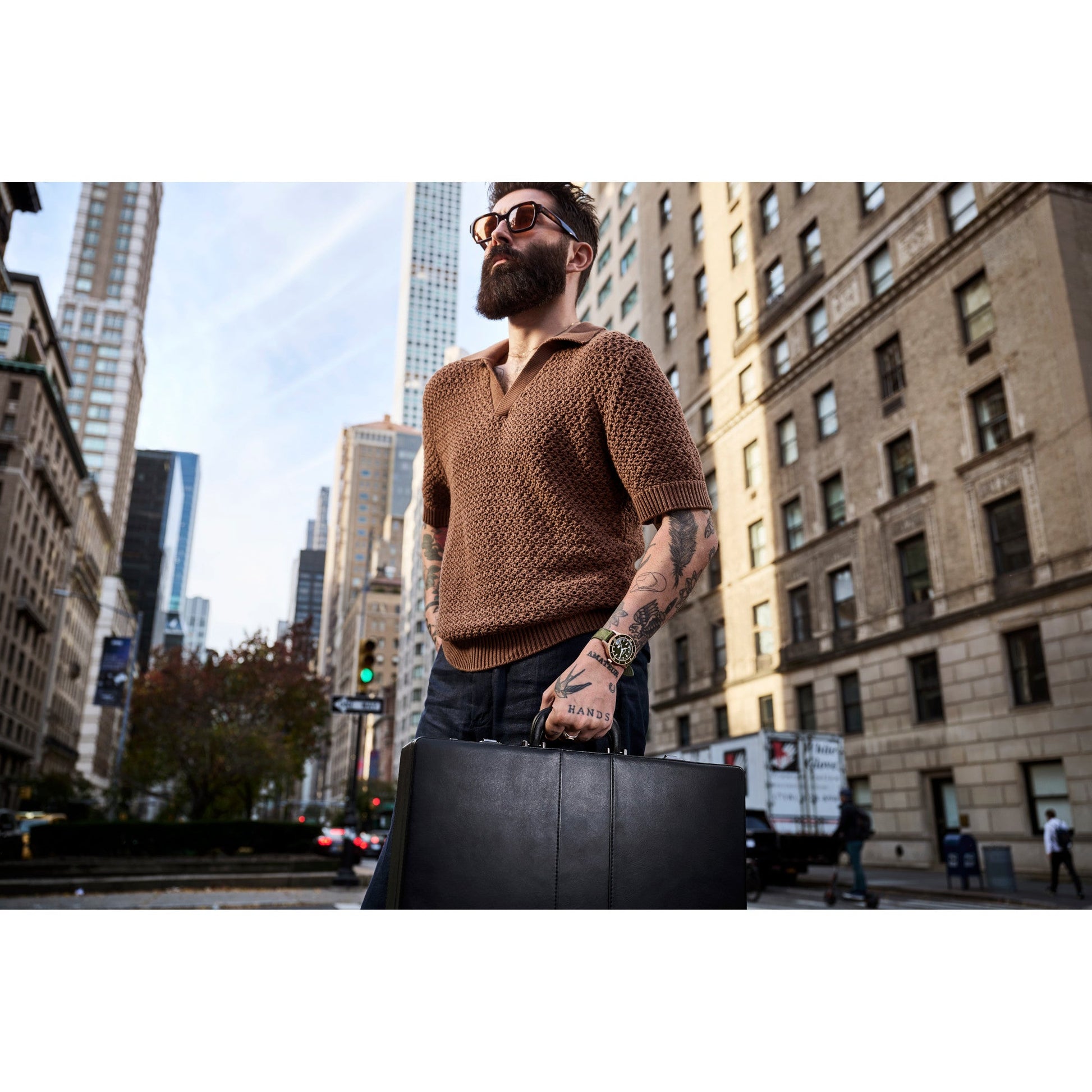 Model wearing the Bulova Mil-Ships 98A324, highlighting its rugged elegance and military-inspired wrist presence.