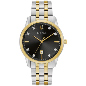 Bulova Sutton 98D165 men's watch front view showcasing a two-tone stainless steel case and bracelet, black dial with eight diamond hour markers, gold-tone hands, and date display at 6 o'clock.