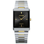 Citizen Stiletto Eco-Drive AR3104-55E featuring a black dial with gold-tone hands and indices, two-tone stainless steel case and bracelet—front view.