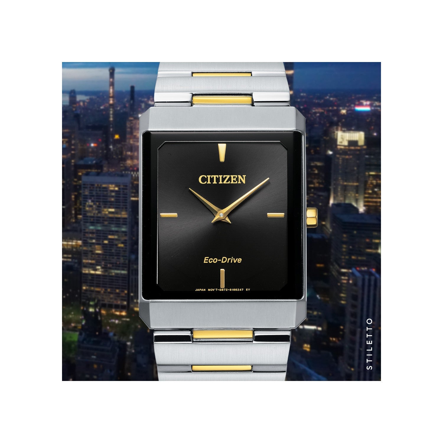 Citizen Stiletto Eco-Drive AR3104-55E featuring a black dial with gold-tone hands and indices, two-tone stainless steel case and bracelet—front view.