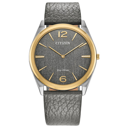 Citizen AR3124-07H two-tone stainless steel watch front view with grey metallic dial, gold-tone hands and markers, and grained grey leather strap.