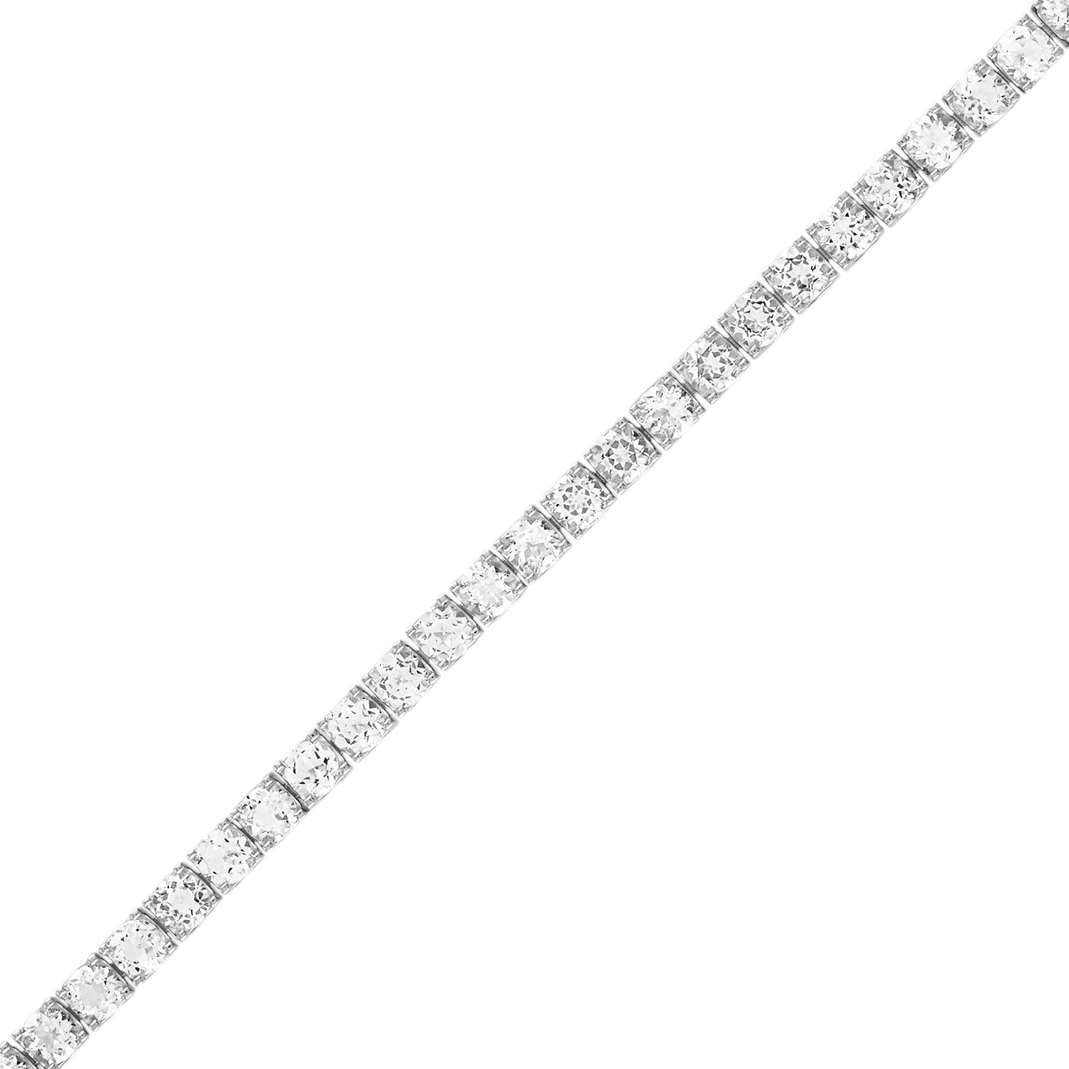 Bulova BVB1017-WSWTO bracelet showcasing rhodium-plated sterling silver with a continuous line of 5mm white topaz gemstones—front view.