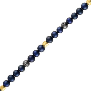 Side profile of the Bulova BVB1049-YSSC5FWP showcasing the arrangement of pearls and accent beads.
