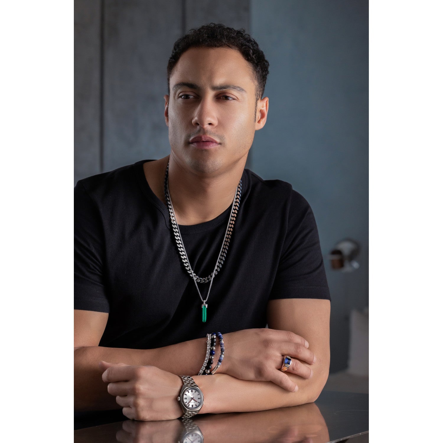 Model wearing the Bulova Classic Curb Chain Necklace BVC1054-SLSTNA, demonstrating its bold and sophisticated presence.