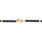 Close-up of the 14K gold-plated sterling silver magnetic cylinder clasp etched with Bulova's tuning fork logo.