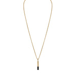 Bulova Latin GRAMMY® Amulet Pendant Necklace BVC1074-YSTBSP, front view showcasing the black and yellow gold-tone stainless steel bar-shaped pendant with faceted black spinel inlay.