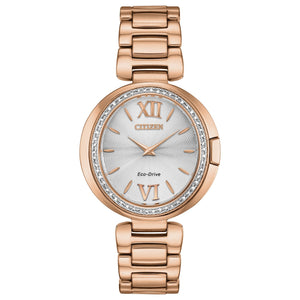 Citizen EX1503-54A Capella watch featuring a pink gold-tone stainless steel case adorned with a diamond-set bezel, silver-tone dial with rose gold-tone hands and index hour markers, and matching bracelet—front view.