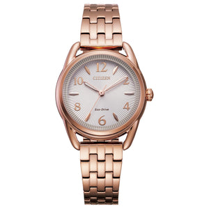Citizen FE1213-50A Drive watch featuring a pink gold-tone stainless steel case, silver-white sunray dial with gold-tone Arabic numerals, and matching bracelet—front view.