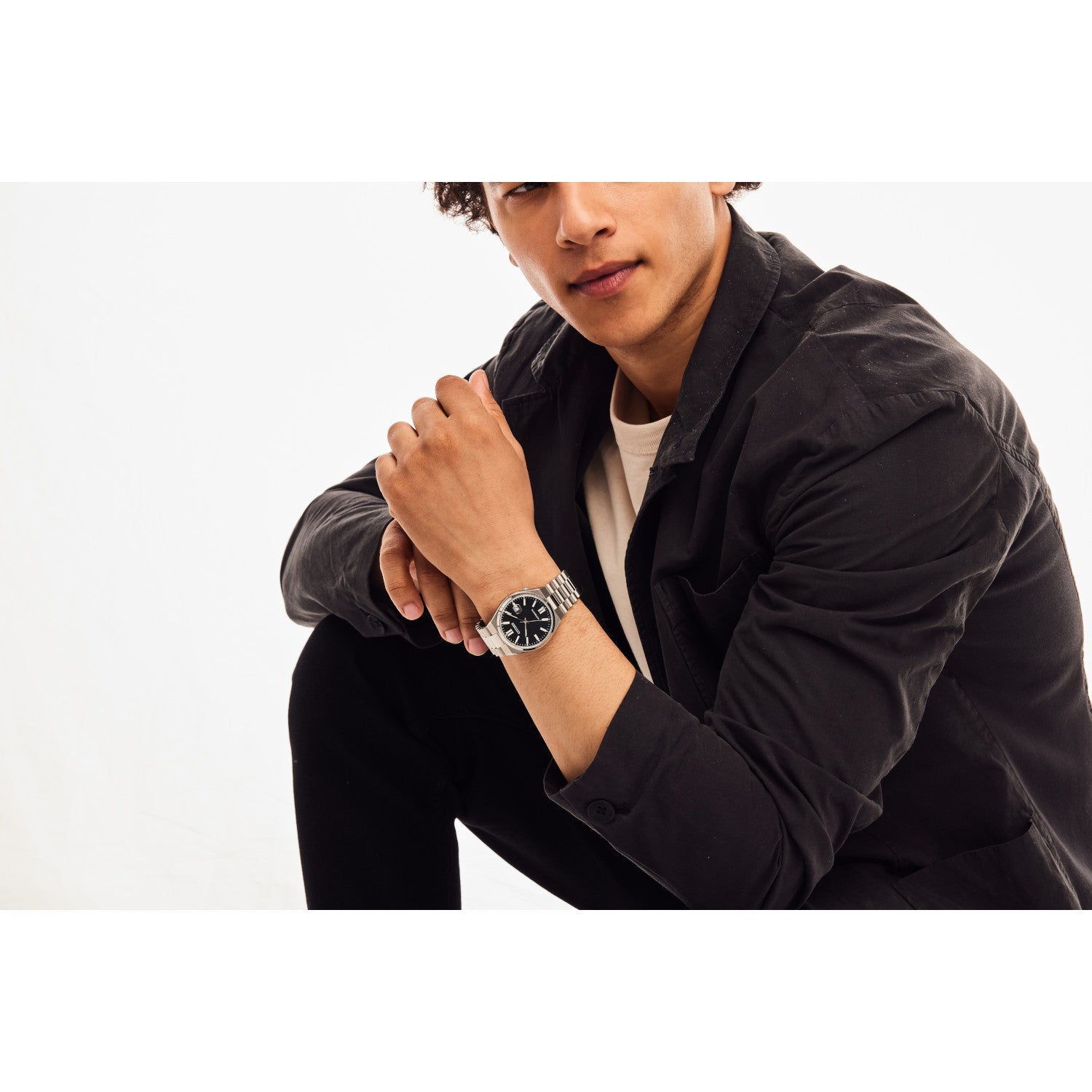 Model wearing the Citizen NJ0150-56E, demonstrating its versatile and elegant wrist presence.