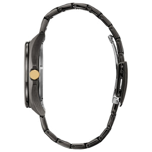 Side profile of the Citizen AW1578-51W, highlighting the dark gray ion-plated stainless steel case and gold-tone crown.
