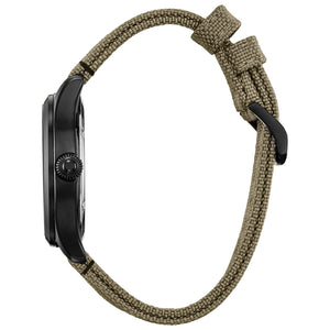 Side profile of the Citizen BM6839-06W showcasing the black ion-plated stainless steel case and beige Cordura® nylon strap.