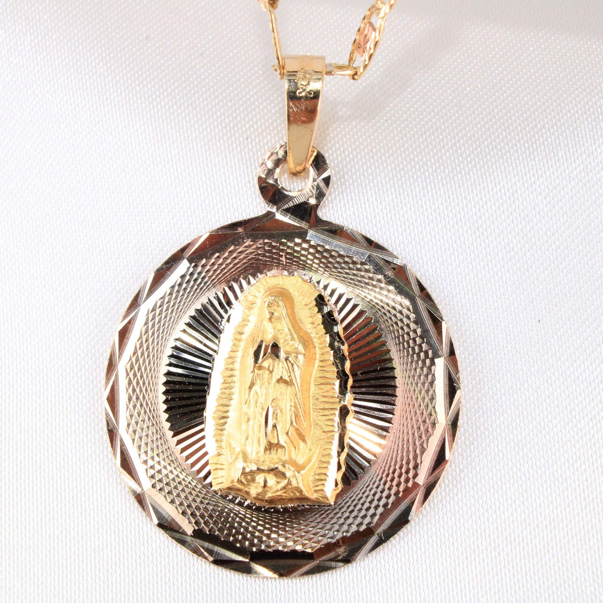 14K Tricolor Gold Virgin Mary Charm14K Tricolor Gold Virgin Mary Charm, Single Sided, Solid.
Chain Sold Separately 14K Tricolor Gold Virgin Mary Charm
 
Material Type–14k Gold 14K Tricolor Gold VirginAll CharmsAlexanderAlexander Gold & Diamonds14K Tricolor Gold Virgin Mary Charm