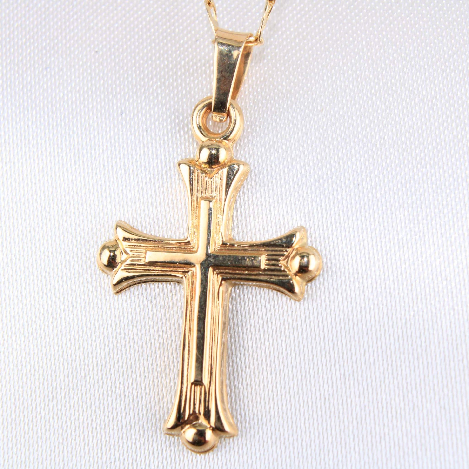 14K Yellow Gold Cross Charm14K Yellow Gold Cross Charm
Chain Sold Separately 14K Yellow Gold Cross Charm
 
Material Type–14k Gold 14K Yellow Gold Cross Charm
 
Approximate Dimensions 14K YelloAll CharmsAlexanderAlexander Gold & Diamonds14K Yellow Gold Cross Charm