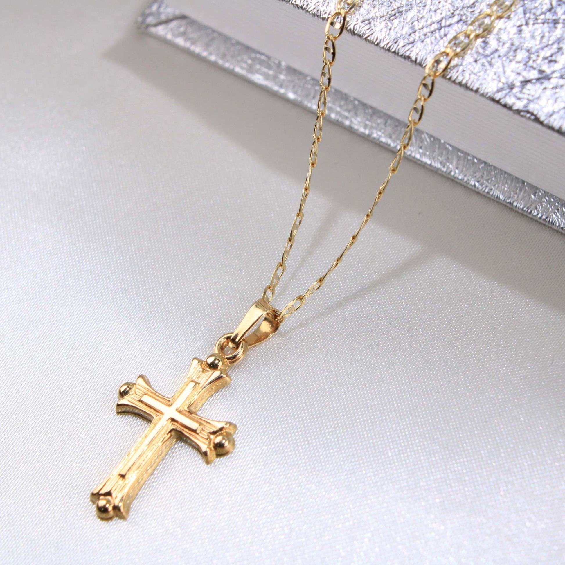 14K Yellow Gold Cross Charm14K Yellow Gold Cross Charm
Chain Sold Separately 14K Yellow Gold Cross Charm
 
Material Type–14k Gold 14K Yellow Gold Cross Charm
 
Approximate Dimensions 14K YelloAll CharmsAlexanderAlexander Gold & Diamonds14K Yellow Gold Cross Charm
