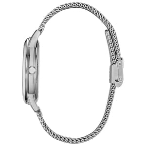 Side profile of the Citizen FE7060-56W, showcasing the slim stainless steel case and mesh bracelet.